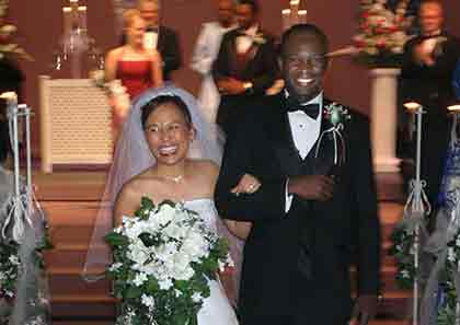 A photo of a man with his Filipino bride.